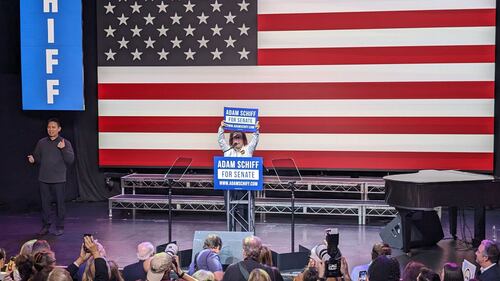 DESCRIBE THE IMAGE FOR ACCESSIBILITY, EXAMPLE: Photo of a chef putting red sauce onto an omelette.