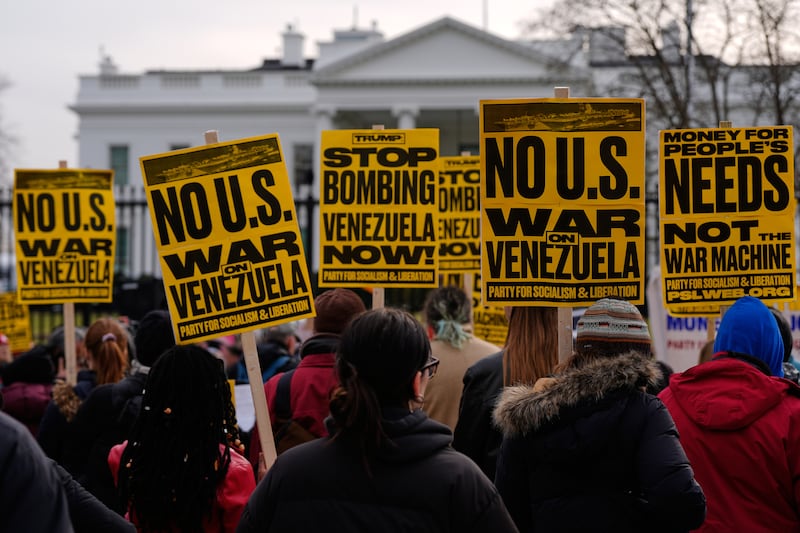 Protesters rally outside the White House Saturday, Jan. 3, 2026, in Washington, after the U.S. captured Venezuelan President Nicolás Maduro and his wife in a military operation. (AP Photo/Julia Demaree Nikhinson)
