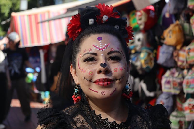 Lidia Molina went to Olvera Street to celebrate her relatives and support her community.
