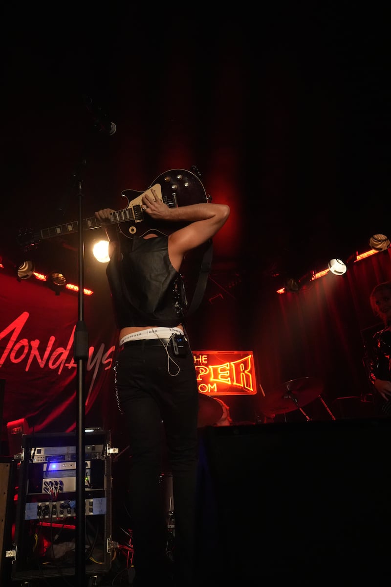 Musician with guitar.