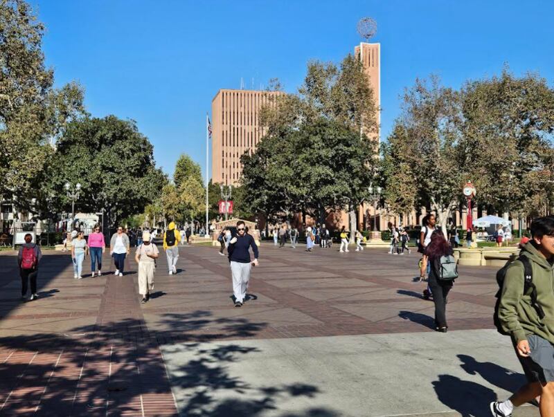 Students walk across Hahn Plaza between classes.