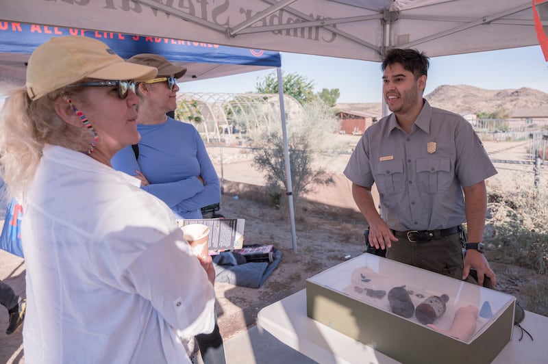 Alex Renteria, an archaeologist from the National Park Service, showcased artifacts such as obsidian tribal spearheads and a miner’s matchbox. He shares why not all trash should be picked up. “Certain objects that look aged should be left in their place and be handled by the service. This way, archaeologists can learn about the park’s geohistorical background,” he explains. (Photo by Michael Chow)