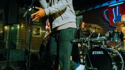 Joshua Wilson opens with band members as the first performance of House Crawl.