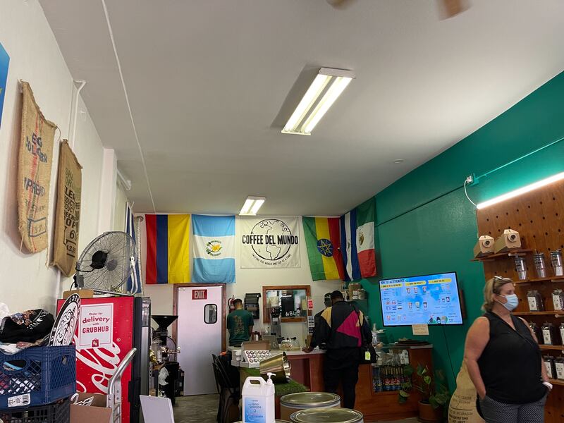 "A photo of customers in a South L.A. coffee shop."