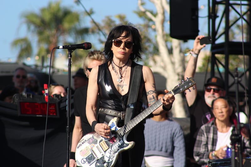 Singer with a guitar.