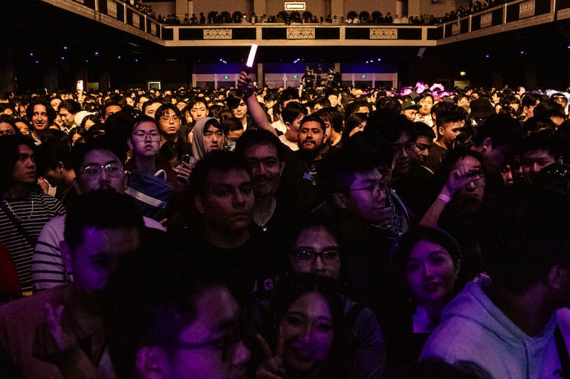 Photo of a crowd of people in a hall