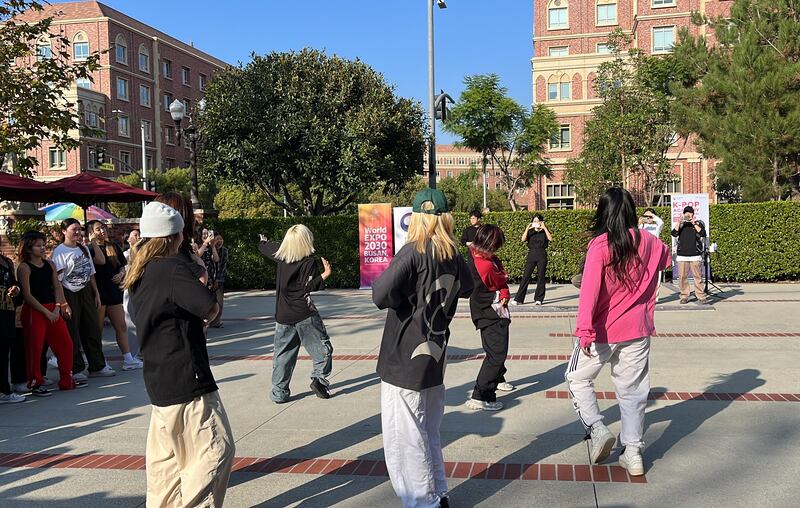 Photo of a group of people dancing out of sync