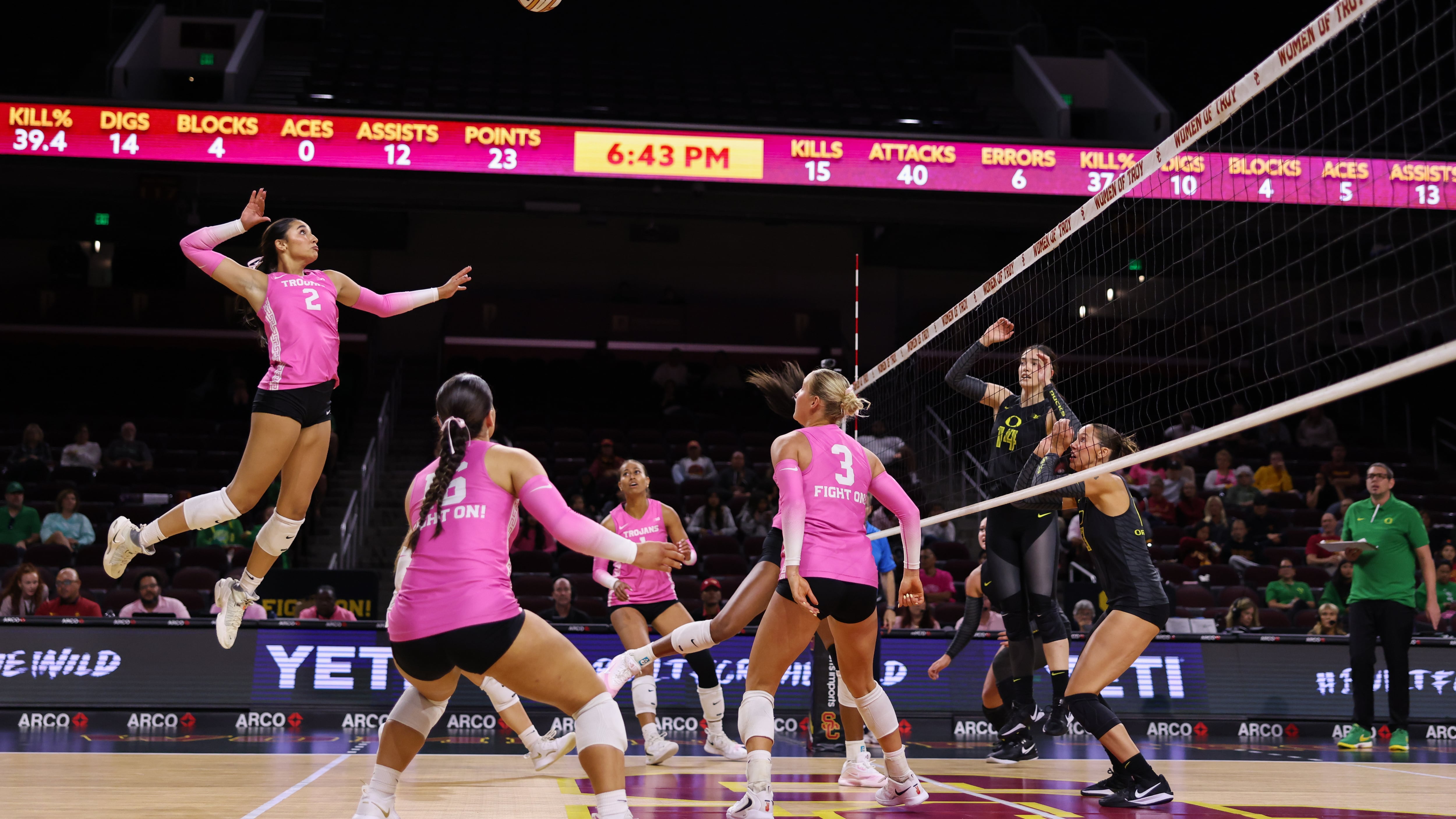 USC outside hitter London Wijay rises in the air for an attack.