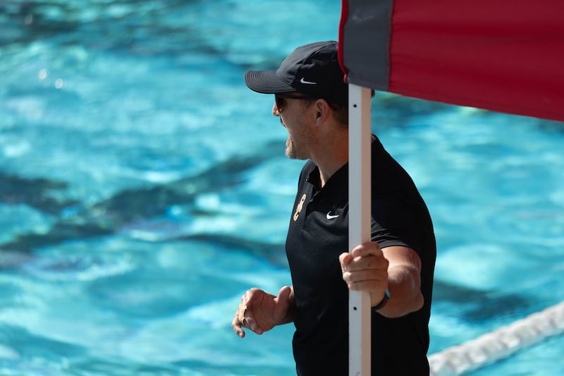 Head coach Marko Pintaric gives instructions from the poolside during USC’s Nov. 8 game against UCSB