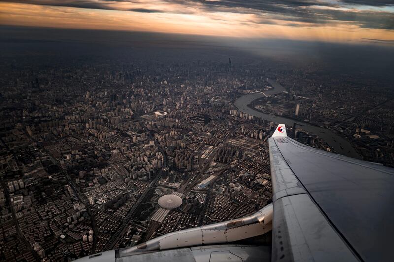 Photo taken from the window of China Eastern Airlines A330 that flies over downtown Shanghai.
