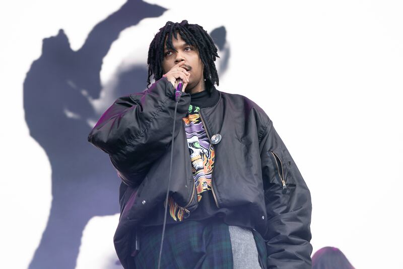 Photo of a man performing.