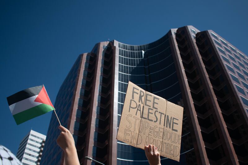 A sign and flag at the “All Out For Gaza” Rally in front of the Israeli Consulate.