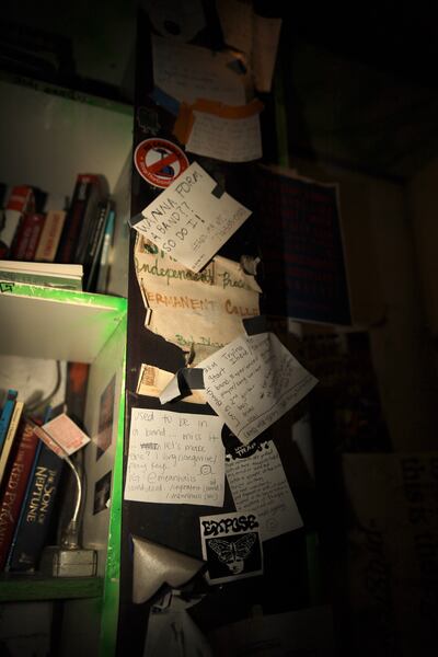 A photo of decor hanging on a wall at The Smell concert venue