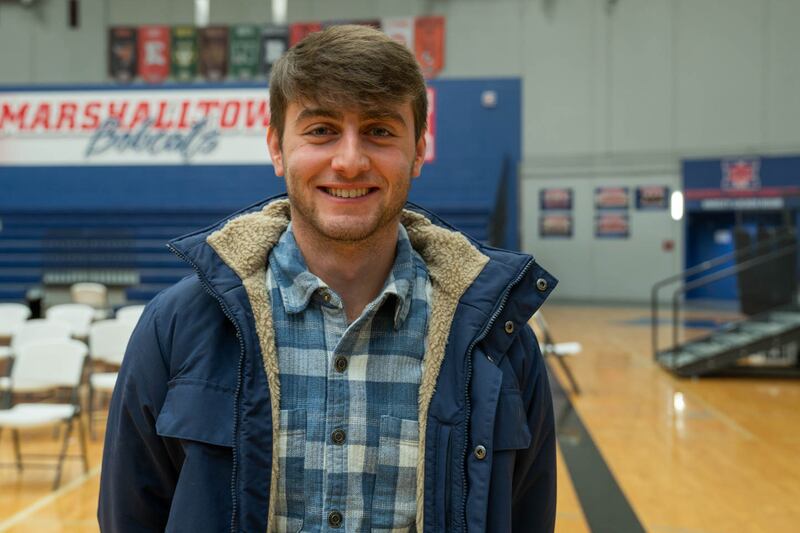 A college student at the caucus.