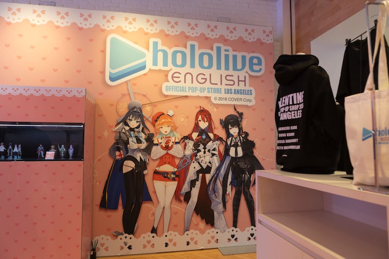 Photo of wallpaper featuring four anime-style girls