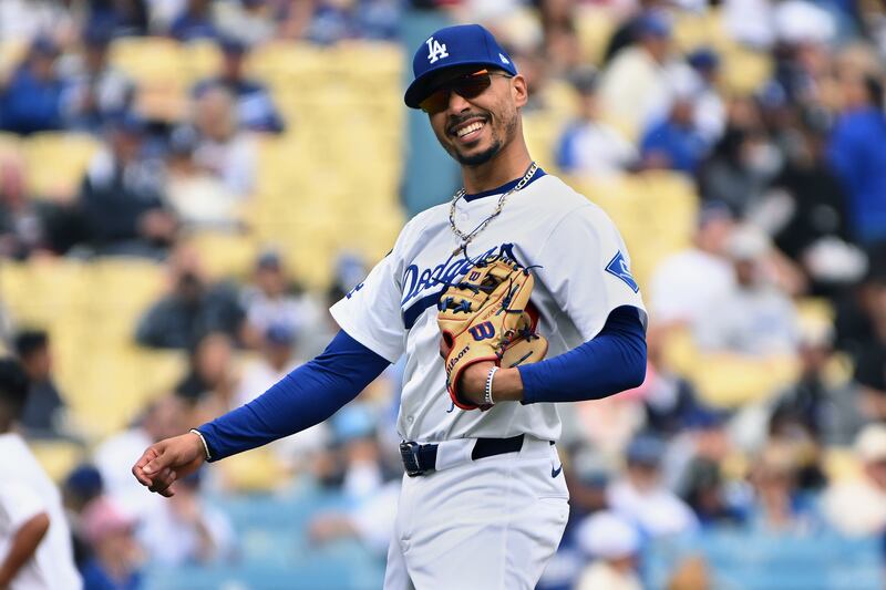 Photo of a baseball player smiling.