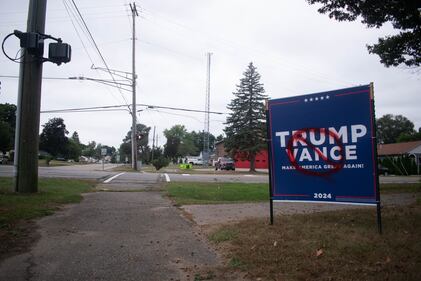 DESCRIBE THE IMAGE FOR ACCESSIBILITY, EXAMPLE: Photo of a chef putting red sauce onto an omelette.