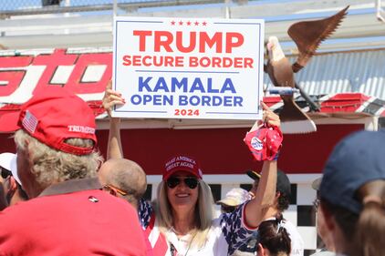 DESCRIBE THE IMAGE FOR ACCESSIBILITY, EXAMPLE: Photo of a chef putting red sauce onto an omelette.