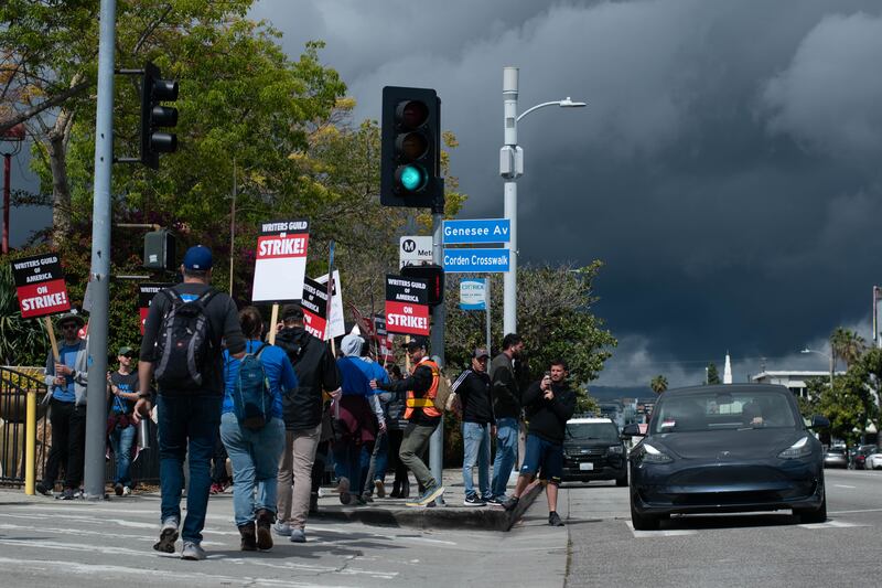 Cars are forced to wait until the traffic light cycle expires to enter the CBS facility.