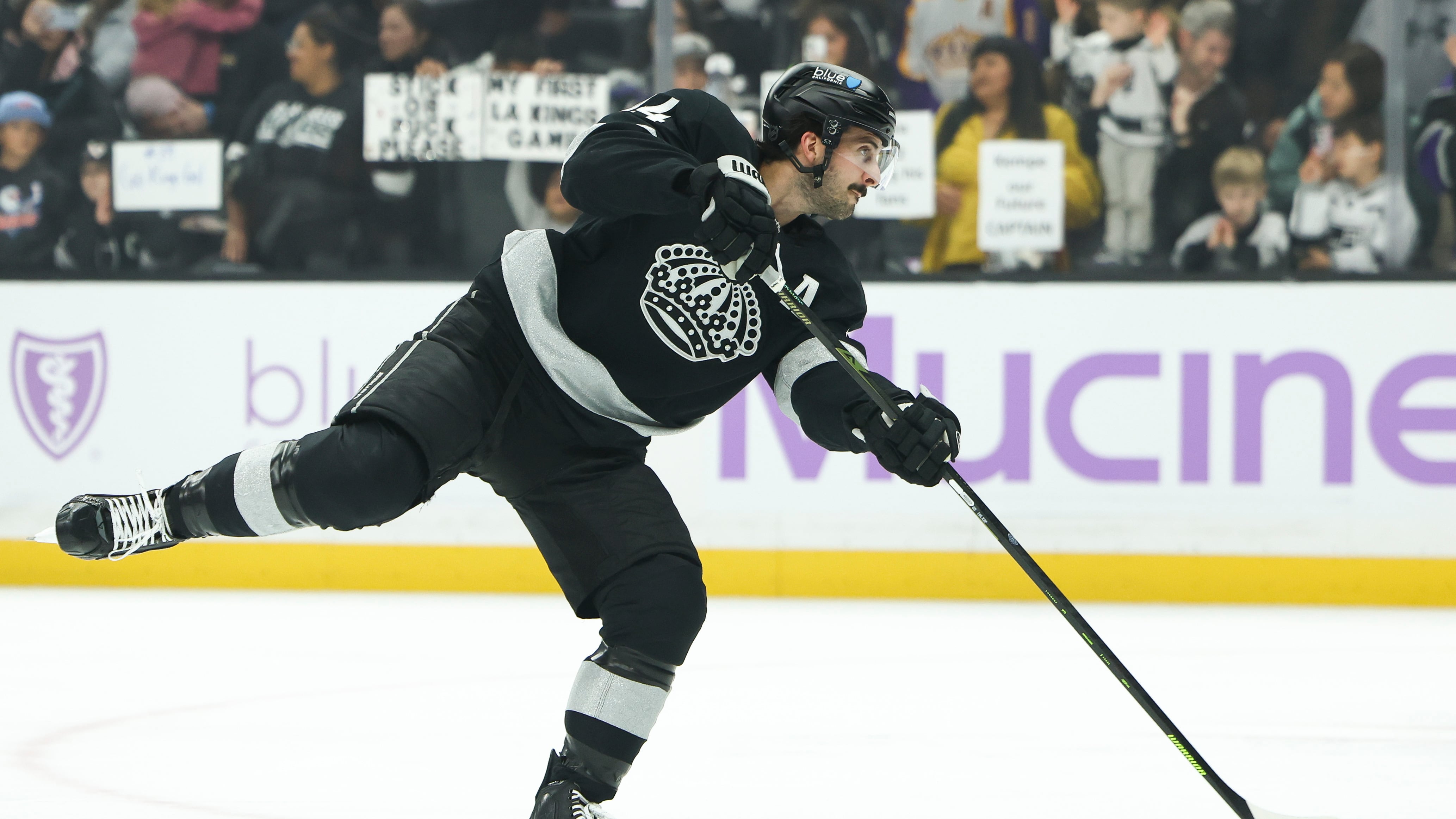 DESCRIBE THE IMAGE FOR ACCESSIBILITY, EXAMPLE: Photo of a chef putting red sauce onto an omelette.