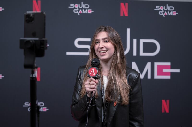 Multimedia journalist Jocelyn Stone reports from the "Squid Game" Red Carpet event hosted by Netflix at NeueHouse Hollywood on Nov 8 2021.