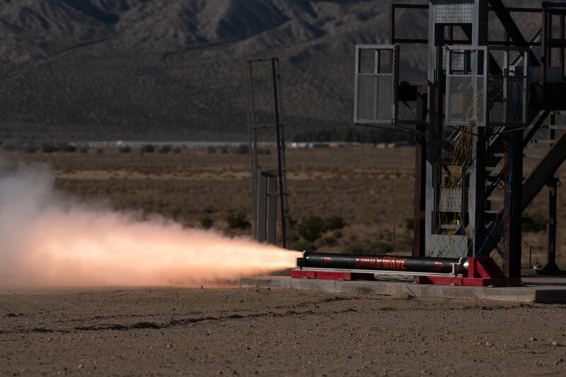 The Shockwave Rocket motor firing at the static fire test in the desert.