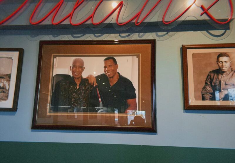 Adolf and Greg Dulan, father and son, picture framed and hanging on one of the walls of Greg Dulan’s restaurant Dulan’s on Crenshaw, on Tuesday, February 23, 2026.