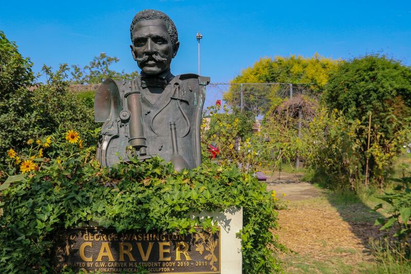 A statue of George Washington Carver at Galindez’s farm.