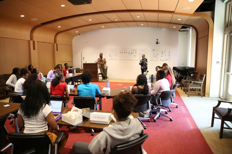 Students and guest speaker DeAndre Brown in the Sheindlin Forum (Photocredit :  @craigstanleycreative)