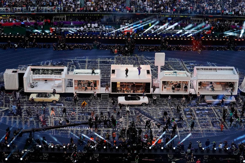 An elaborate white set for the 2022 Super Bowl that showcases local staples of Los Angeles.