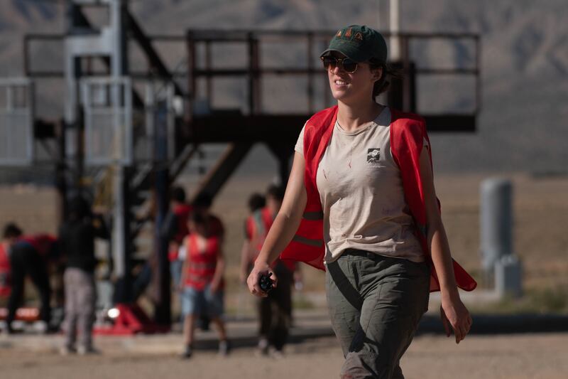 Jessica Ridgeway, the lead propulsion engineer, walks towards the bunker before the static motor test.