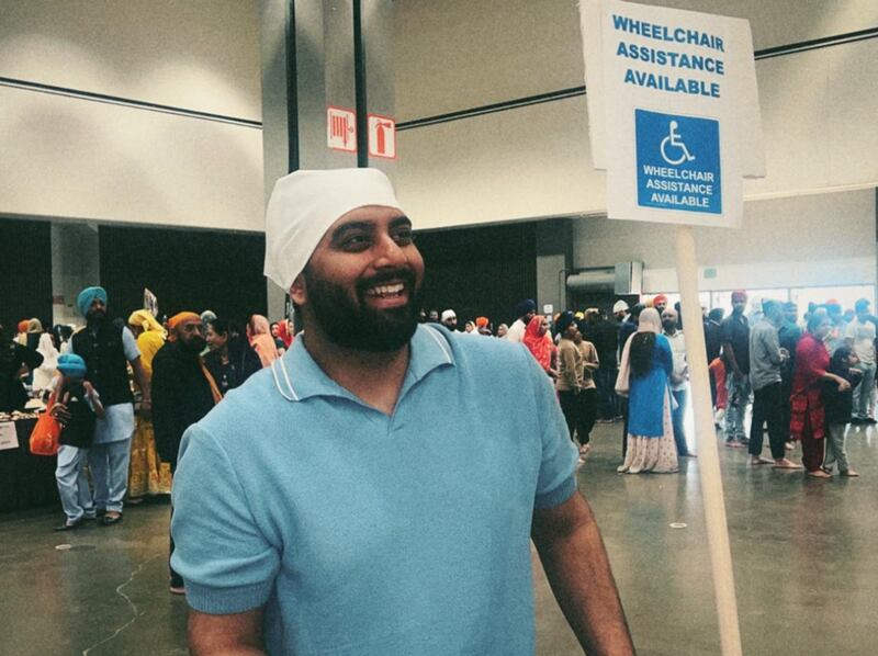 DESCRIBE THE IMAGE FOR ACCESSIBILITY, EXAMPLE: Photo of a chef putting red sauce onto an omelette.