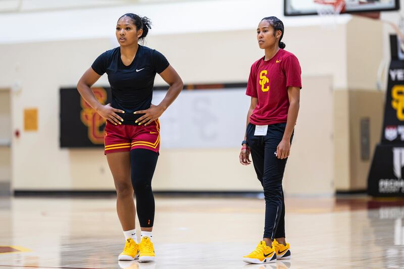USC junior guard Malia Samuels, left, stands alongside assistant coach Courtney Jaco during practice at the Galen Center, Wednesday, Sept. 10, 2025.