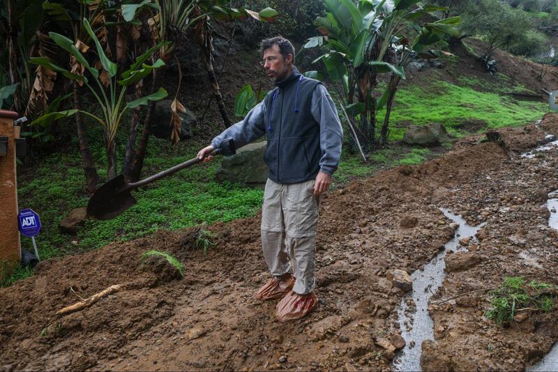 Photos by USC Annenberg Media photojournalists of landslides in Studio City caused by rainfall.