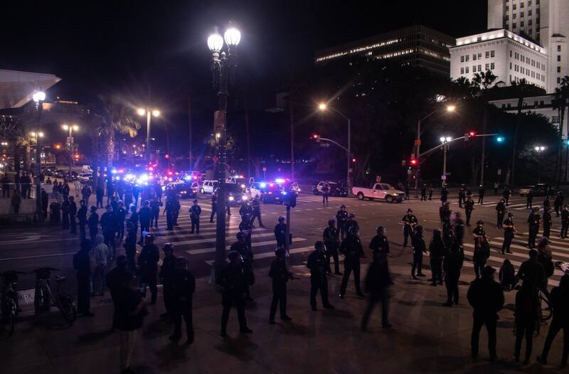 [Photo of LAPD blocking street around LAPD HQ during protest.]