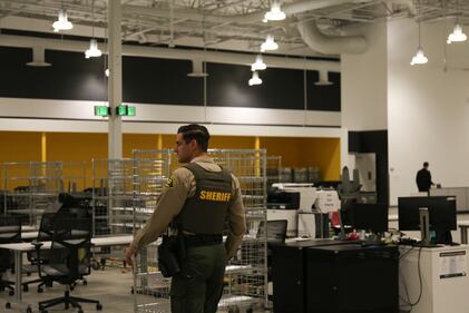 Sheriff patrols the ballot processing center, near the signature verification section of the facility at City of Industry on Mar. 5, 2024.