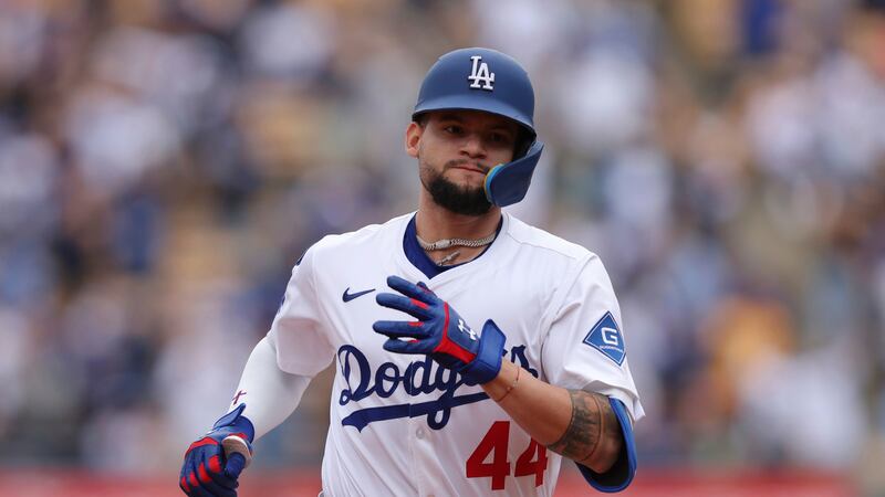 Photo of a baseball player running.