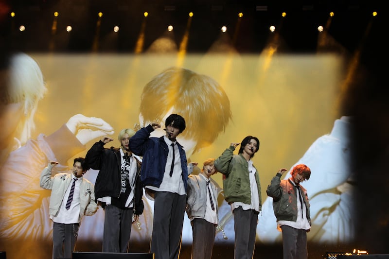 K-pop group performing on stage
