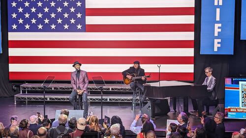 Grammy nominated singer Aloe Blacc performs soul samples with a guitarist and pianist.