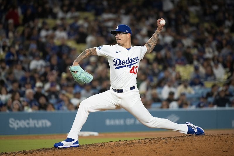 Photo of a baseball player pitching.