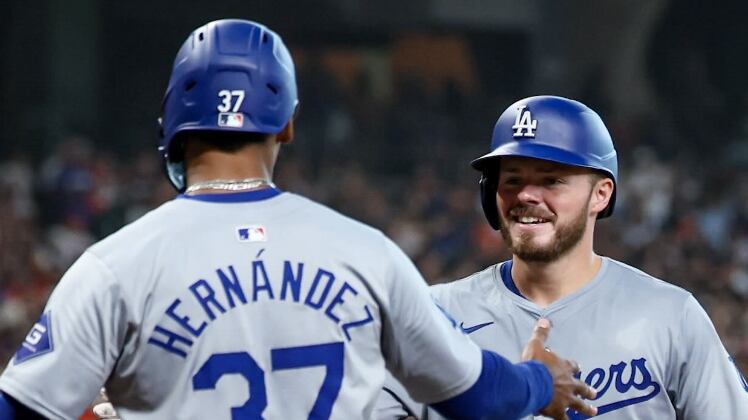 Teoscar Hernández and Gavin Lux celebrating.