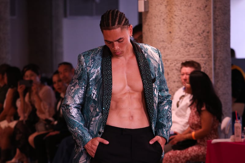 Model walking on runway