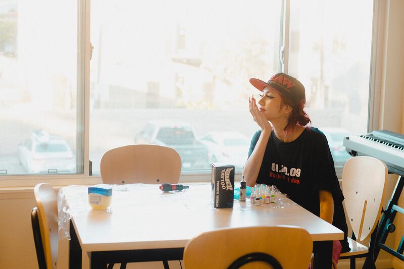 Easton keeps her tattooing equipment in her apartment and sees clients at home. (Photo by Alex Lam)