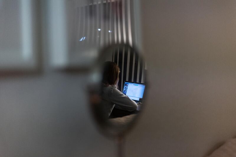 A view of Woodworth on Zoom through a door.