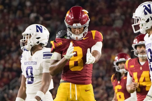 USC takes down Northwestern under the Friday night lights of the Coliseum