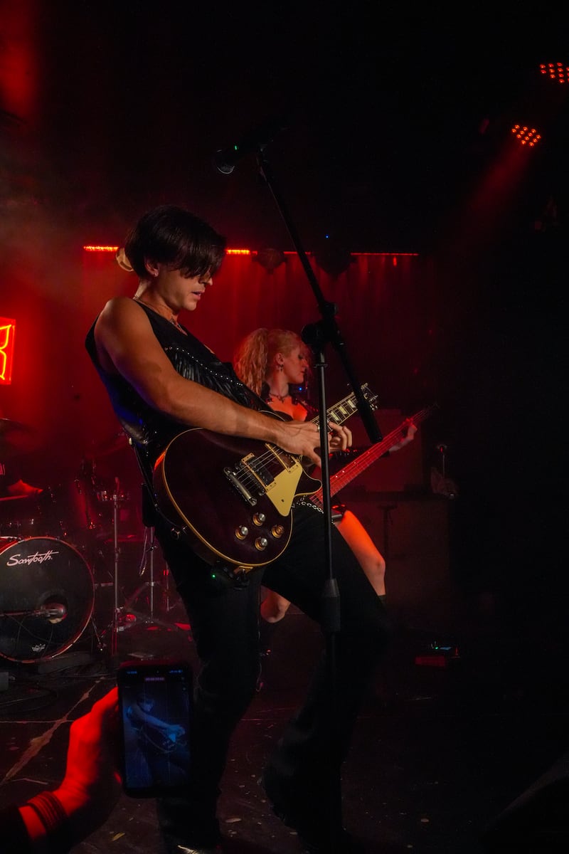 Musicians with guitars.