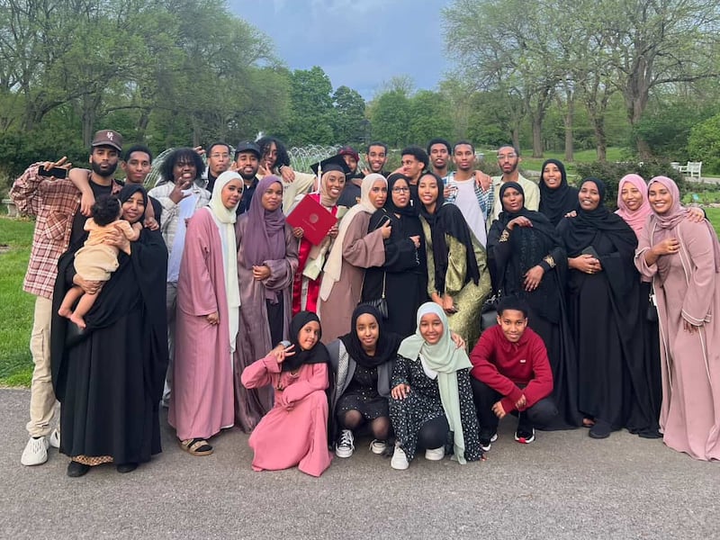 DESCRIBE THE IMAGE FOR ACCESSIBILITY, EXAMPLE: Photo of a chef putting red sauce onto an omelette.