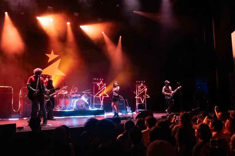 Sobs and Anamanaguchi performing together on stage