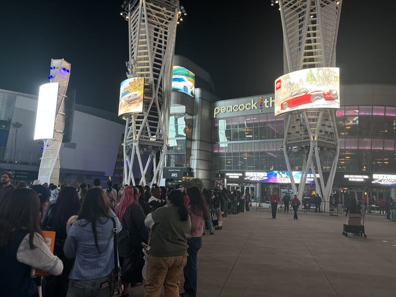 Fans line up outside a venue