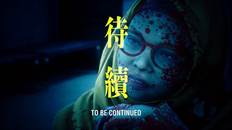 Game screenshot of a woman in a head covering with the words "To Be Continued" imposed over the screen